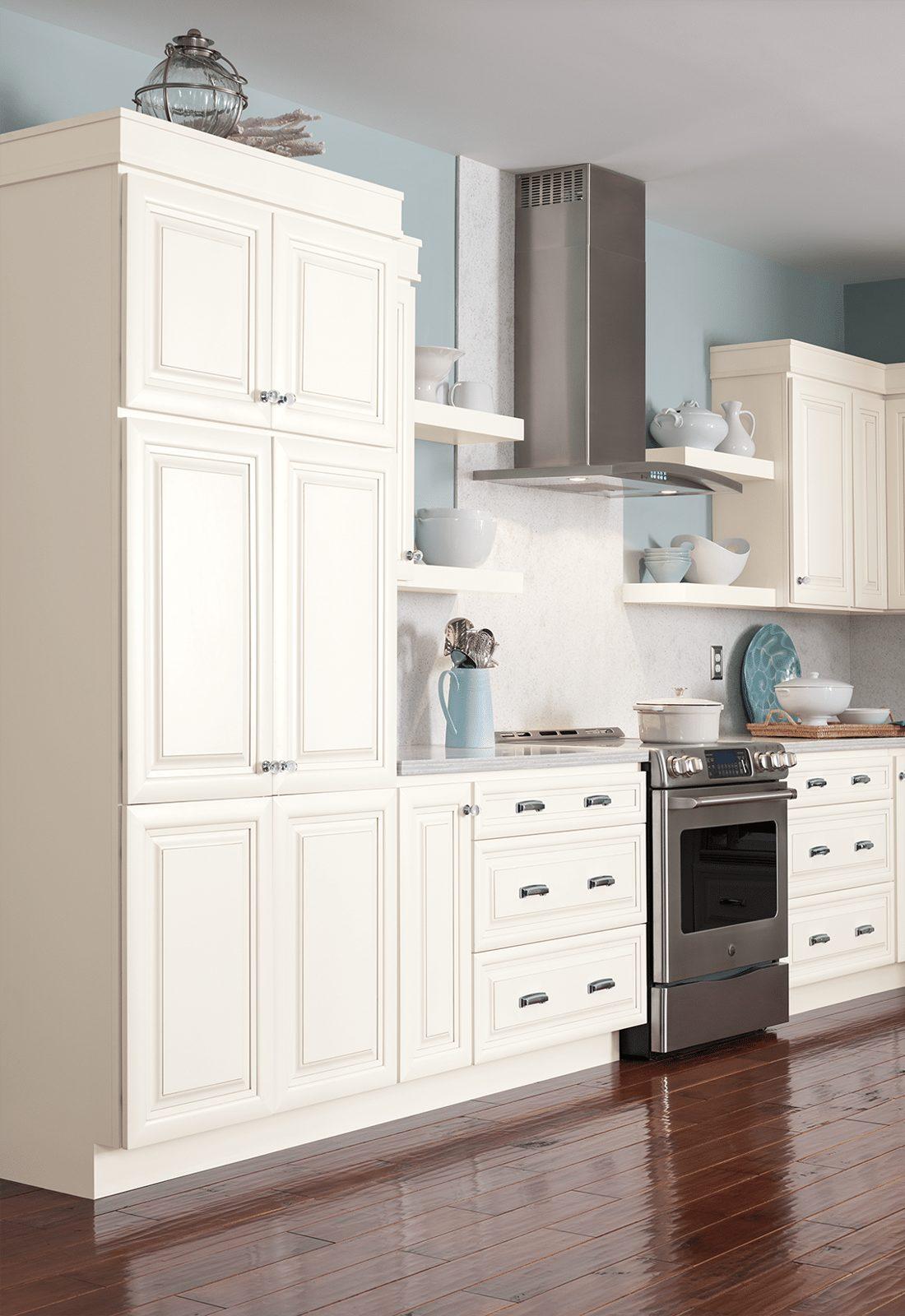 Remodeled kitchen with custom cabinetry and a large island