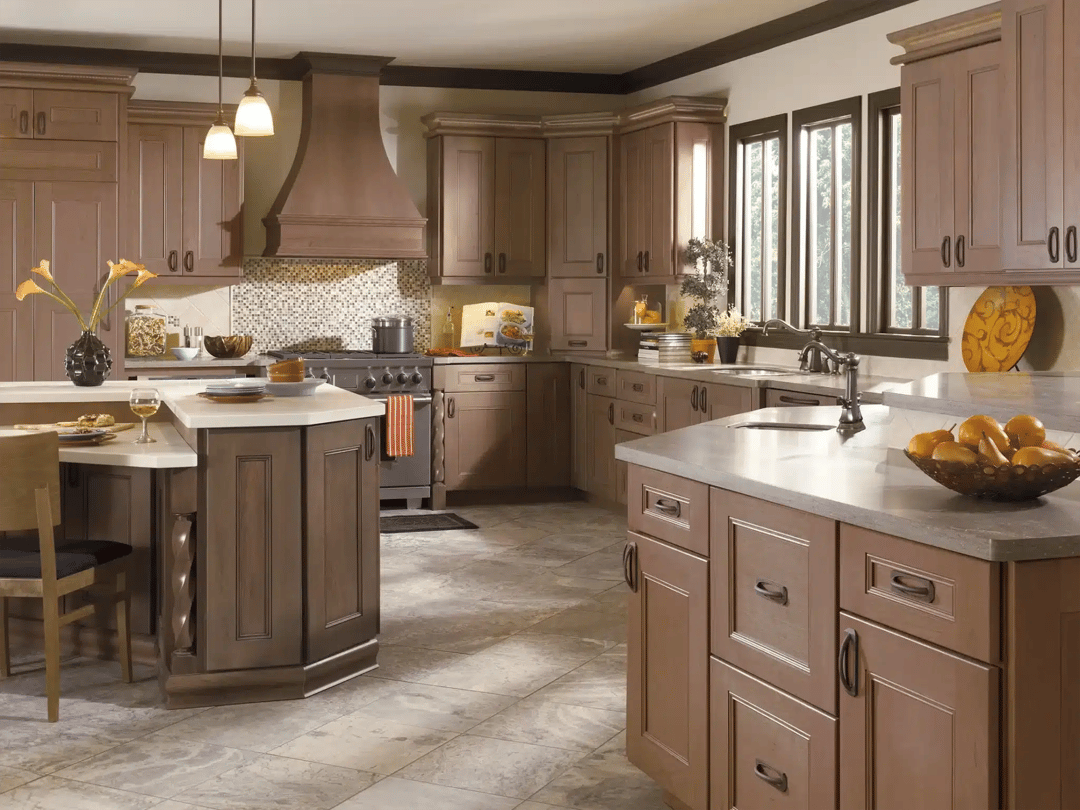 Kitchen with an island, pendant lighting and stone countertops