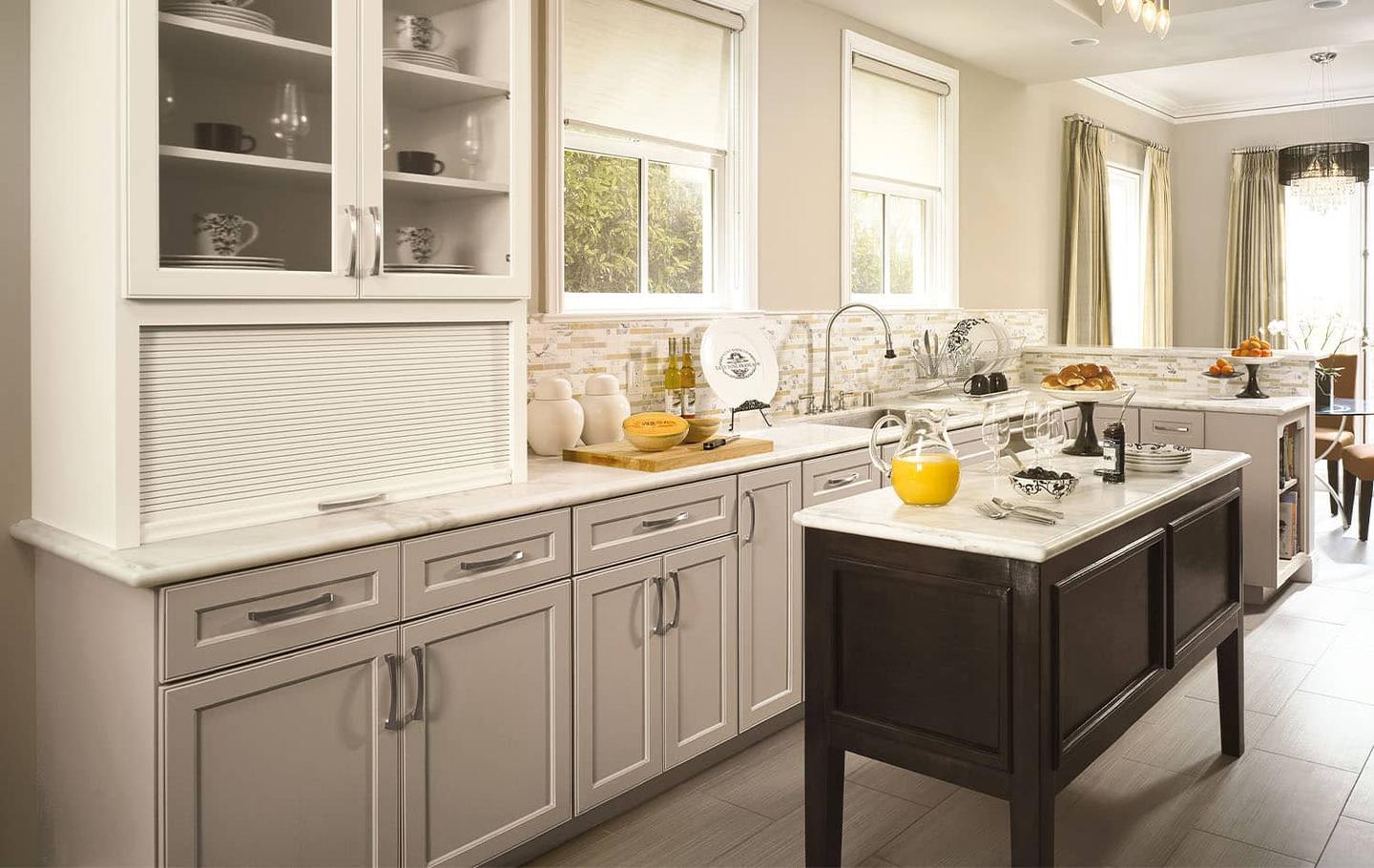 Kitchen with a sink beneath a window and wood cabinetry