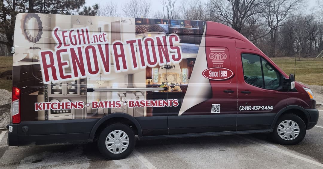 Seghi Renovations branded work van parked at the roadside