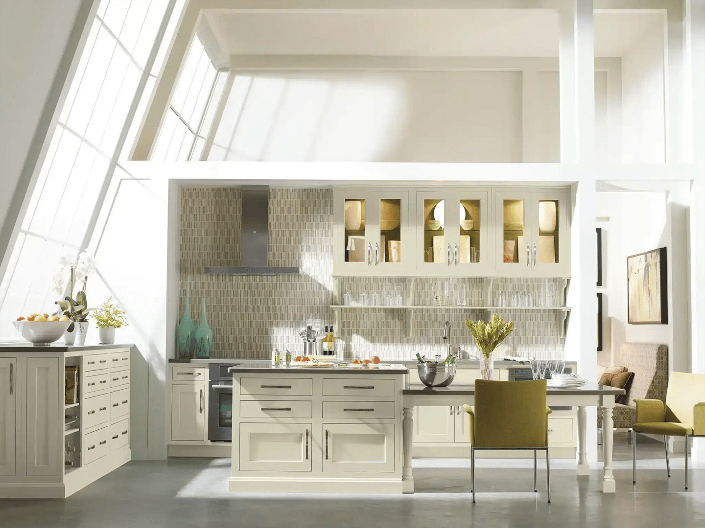 Custom kitchen with cream cabinetry and a tiled backsplash
