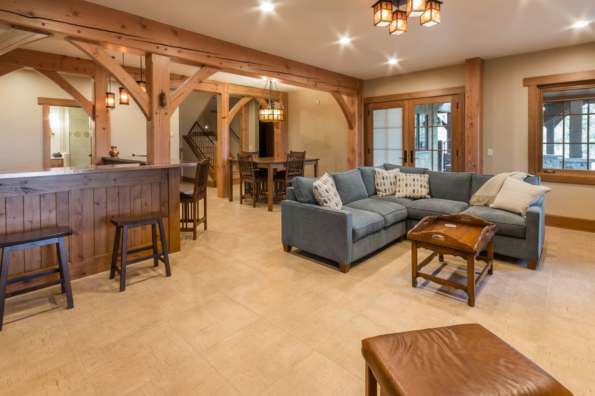 a living room filled with furniture and a large window