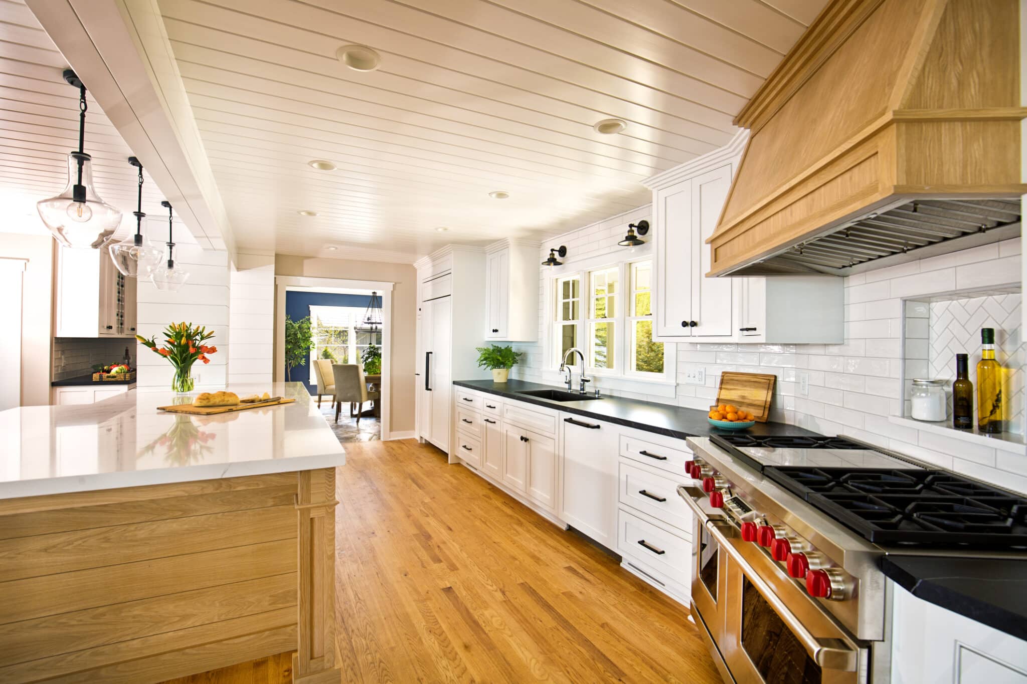 a large kitchen with stainless steel appliances